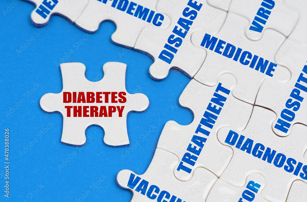 On the blue surface, puzzles with medical inscriptions, on a separate puzzle it is written - DIABETES THERAPY On the blue surface, puzzles with medical inscriptions, on a separate puzzle it is written - DIABETES THERAPY