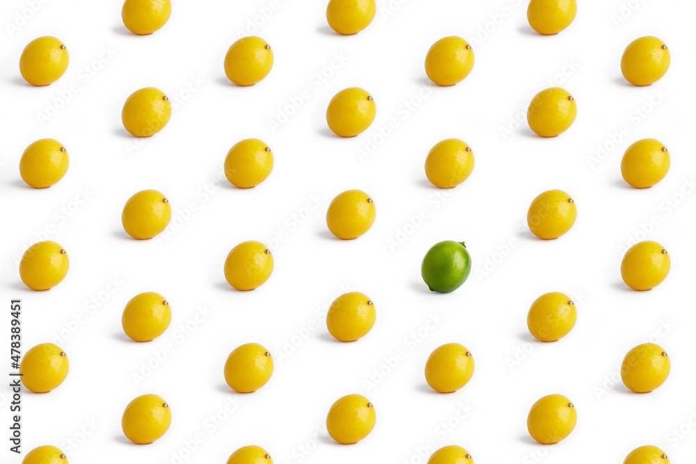 Pattern of lemons and one lime on a white background Pattern of lemons and one lime on a white background