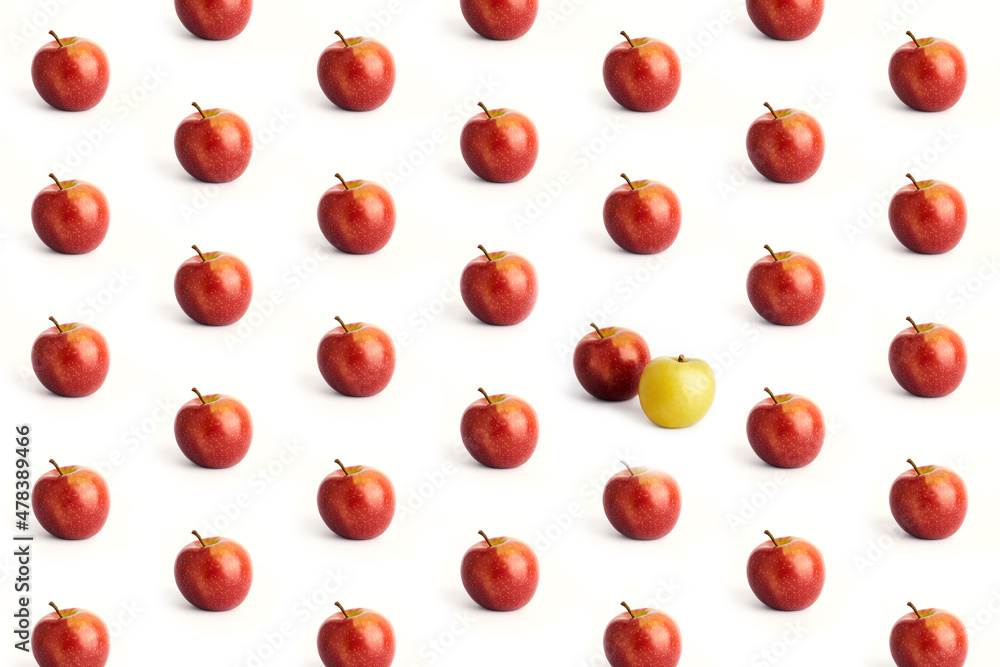 Pattern from red apples and one yellow apple on a white background. Pattern from red apples and one yellow apple on a white background.