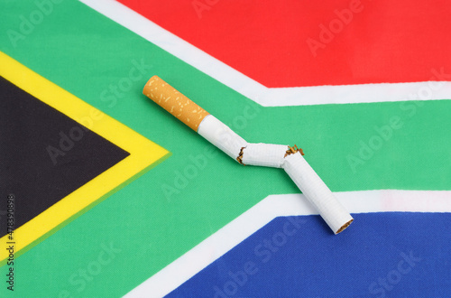 A broken cigarette is on the flag of South Africa, as a symbol of the harm of smoking.