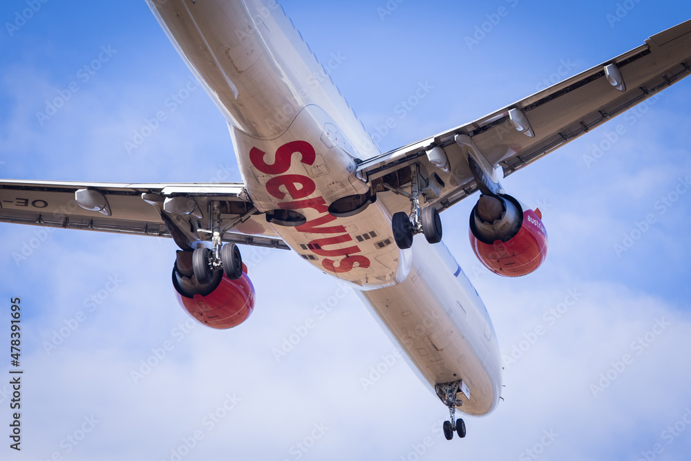 Embraer 195 of Austrian Airlines AUA saying Servus as a greeting on