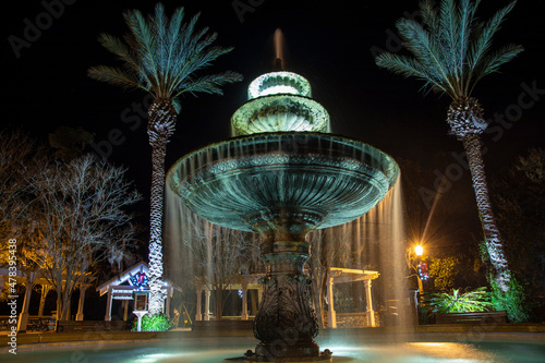 The fountain in the park in St Marys, Georgia at night.