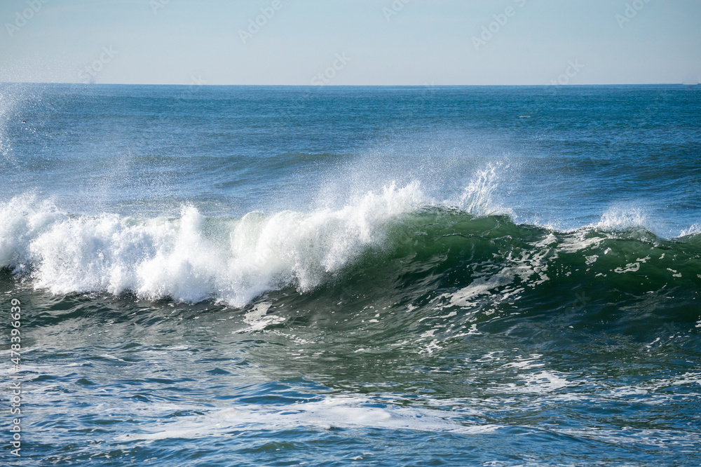 waves crashing on rocks