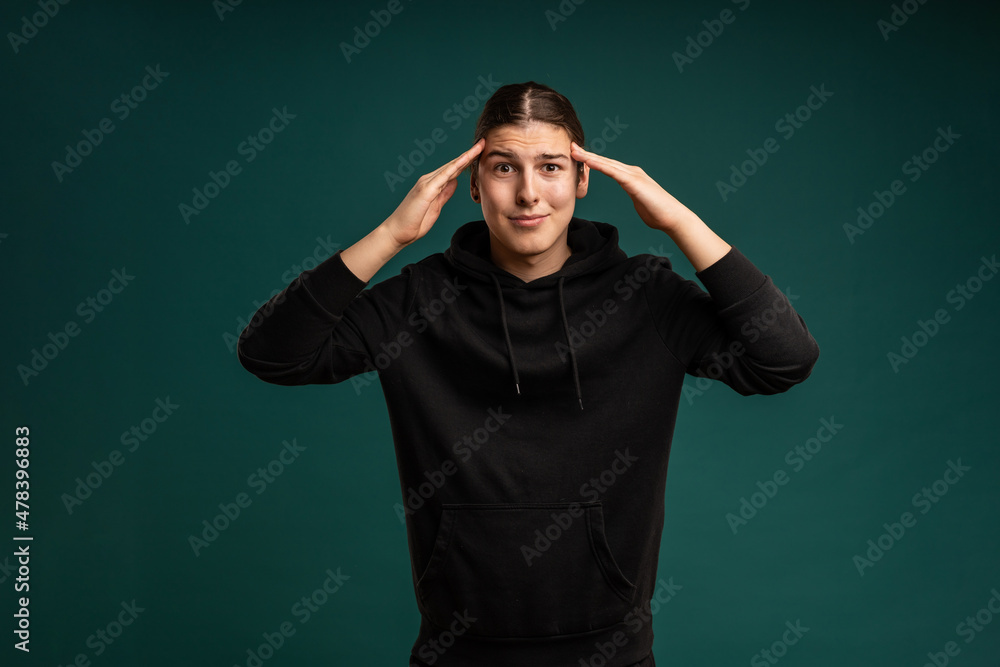 crazy expression of a young man. Cropped studio portrait of male mood crazy expression of a young man. Cropped studio portrait of male mood