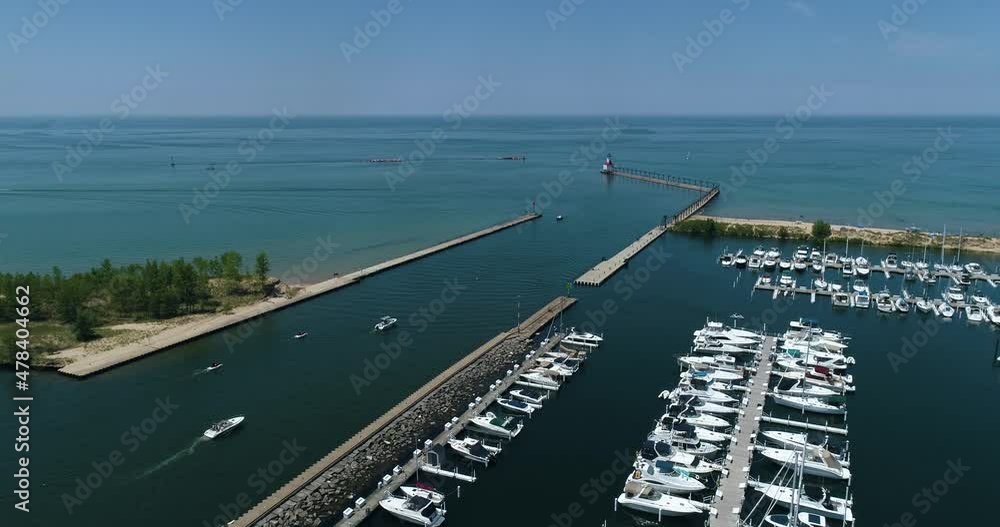 Aerial Shot of Lake Michigan Beach and Marina. Sail Boats, Sand, Pier, etc. Aerial Shot of Lake Michigan Beach and Marina. Sail Boats, Sand, Pier, etc.