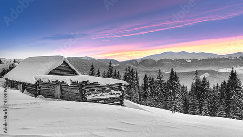Snow-covered hut in winter Carpathian Mountains © maximus19