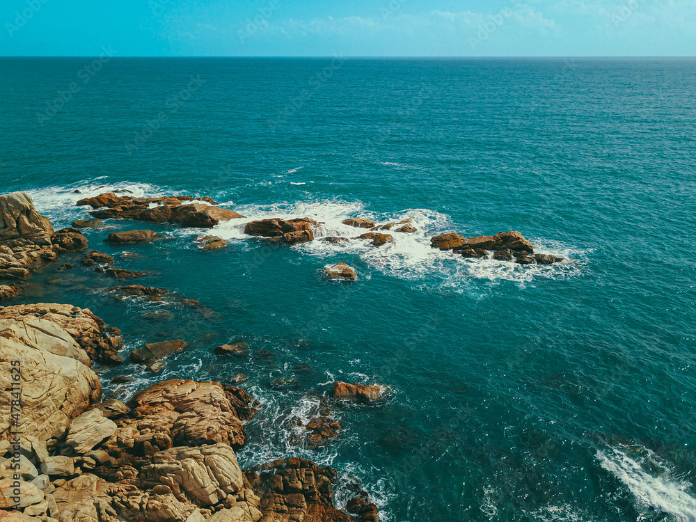 Aerial drone view of seascape in Ganh Da Dhia, Phu Yen, Vietnam. Dia Reef or Ganh Da Dhia is one of famous attraction in Phu Yen, Vietnam. Aerial drone view of seascape in Ganh Da Dhia, Phu Yen, Vietnam. Dia Reef or Ganh Da Dhia is one of famous attraction in Phu Yen, Vietnam.