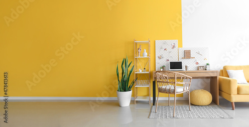 Stylish workplace with peg ...