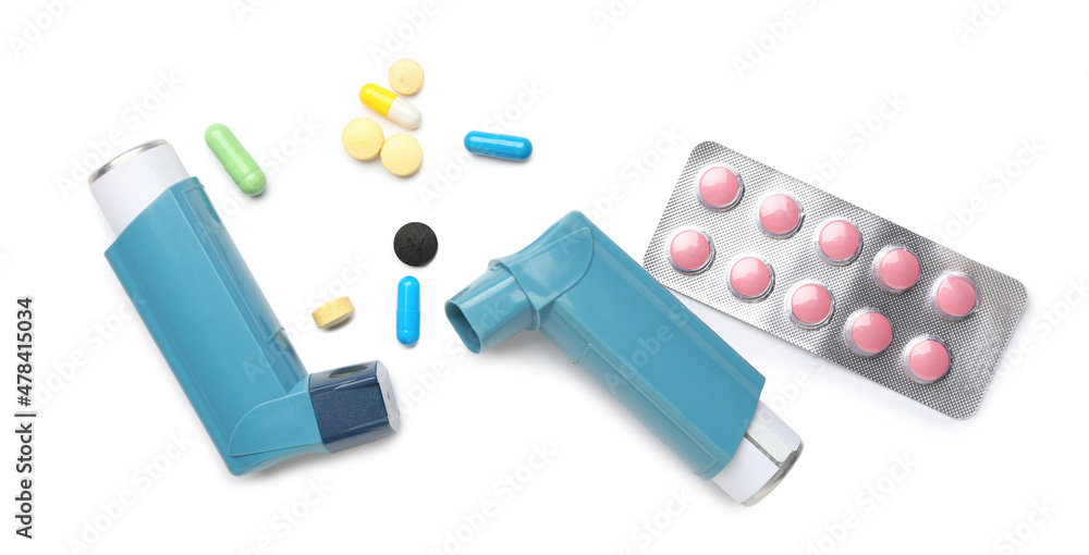 Asthma inhalers and tablets on white background Asthma inhalers and tablets on white background