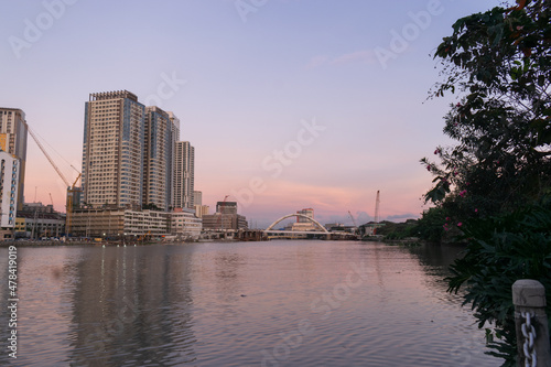 City skyline along the Pasig River during sunset. Manila, Philippines