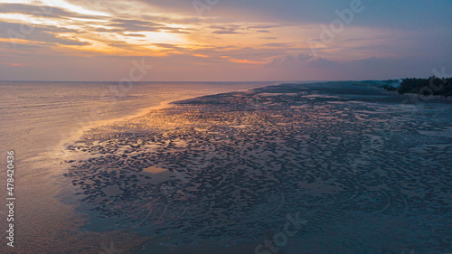 Aerial drone shot of seascape against the sky during golden hour at Sekinchan  Selangor  Malaysia.