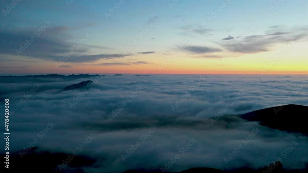Sunrise time lapse aerial shot of San Luis Obispo, California. Low clouds, green hills and views for miles Sunrise time lapse aerial shot of San Luis Obispo, California. Low clouds, green hills and views for miles