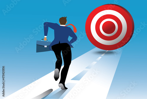  Businessman running to the target. Concept business success