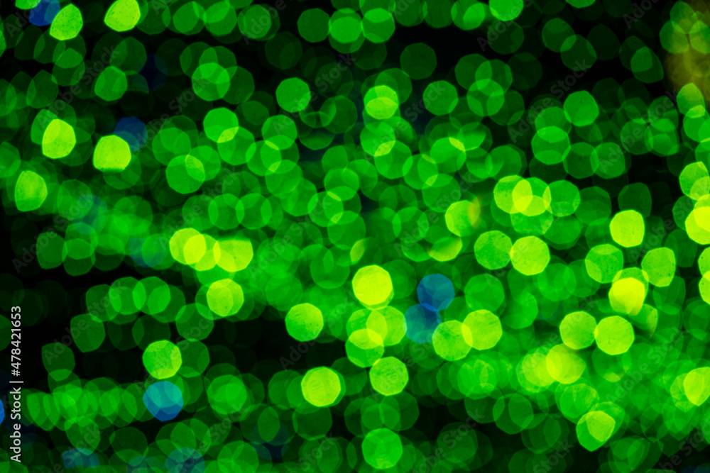 Holiday lights in out of focus. Christmas lights. Holiday background. Winter illuminations. Holiday lights in out of focus. Christmas lights. Holiday background. Winter illuminations.