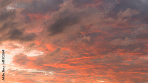 sunset with clouds in the orange sky © Anderson