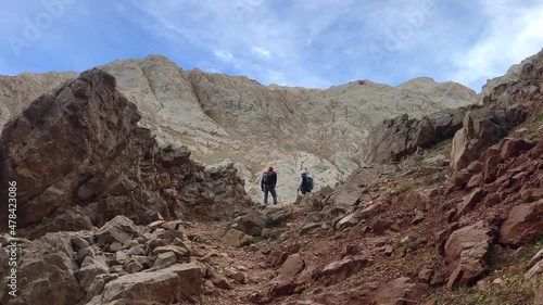 Mountaineers resting at Aladaglar Mount Emler route in Nigde, Turkey. Aladaglar is most important mountain range in Turkey. photo