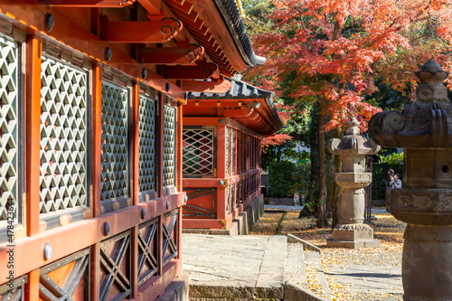 detail of the wall exterior of nezu shinto shrine in autumn tokyo