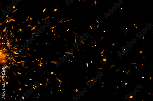Sparks from firework in front of black backgound Fototapet