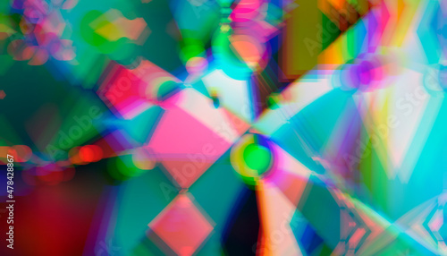 Abstract multicolored geometric glowing background with a prism effect.