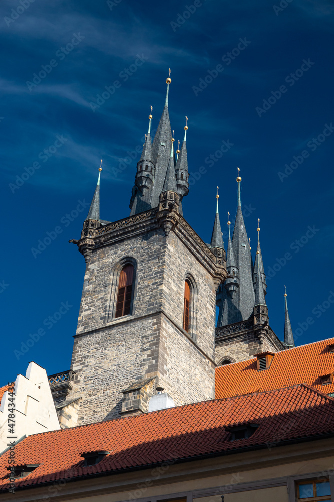 Fototapeta premium Travel to Czech Republic. Tyn Church spectacular building in Prague in a beautiful summer day, in the Old Town Square. Landmarks of Prague.