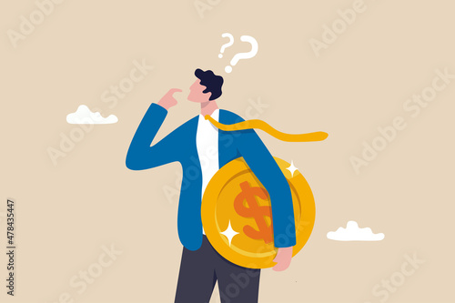 Money question, where to invest, pay off debt or invest to earn profit, financial choice or alternative to make decision concept, businessman investor holding money coin thinking about investment.