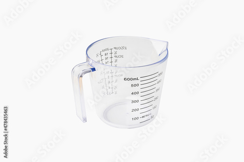 Cuadro en lienzo Empty Clear Color Plastic Graduated Measuring Cup or measuring jug  on white bac