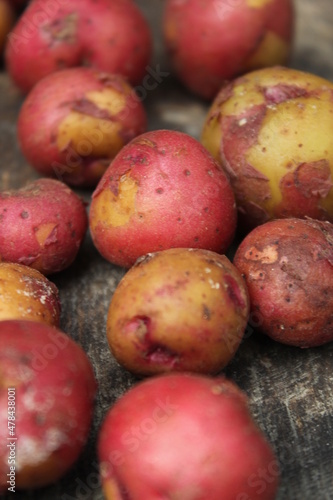 Closeup shot of little red potatoes on a table