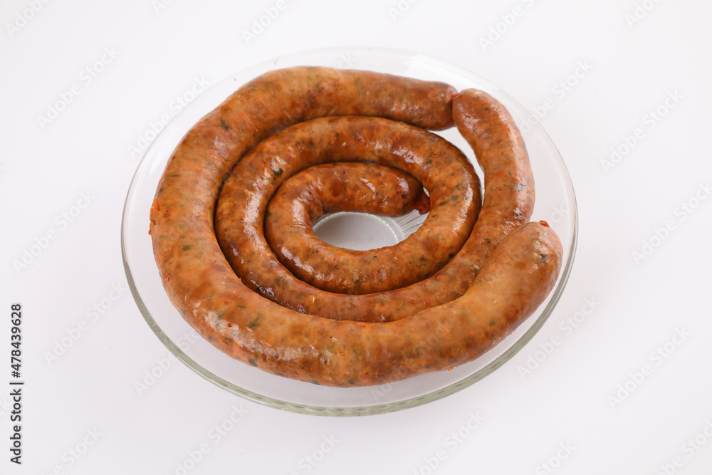 Fototapeta premium Local Northern Thai food , Northern Thai spicy sausage street food isolated in white background