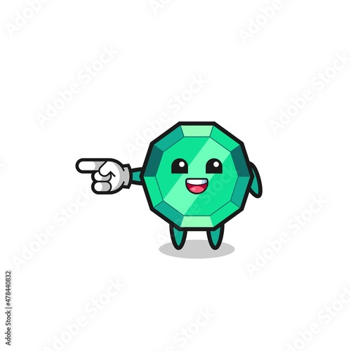 emerald gemstone cartoon with pointing left gesture