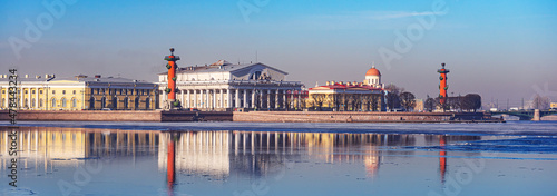 St. Petersburg, Russia – March 17, 2015: view of the water area river Neva, arrow of the Vasilyevsky Island, the Rostral Columns and stock exchange building photo