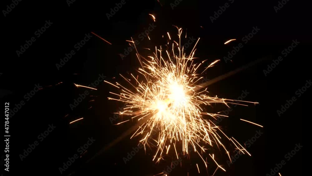 Handheld sparkle firework isolated on black Handheld sparkle firework isolated on black