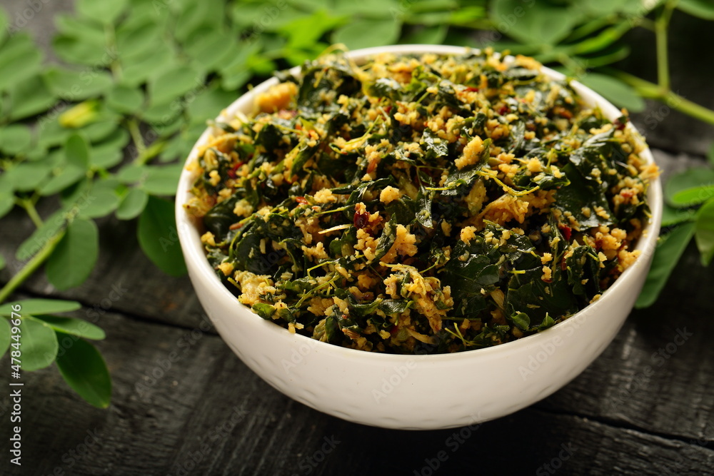 Moringa oleifera leaves stir fry with coconut , spices, herbs, Kerala vegetarian cooking recipes. Moringa oleifera leaves stir fry with coconut , spices, herbs, Kerala vegetarian cooking recipes.
