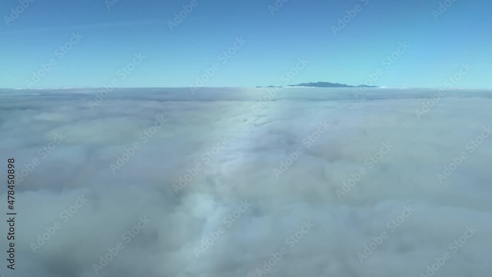 Aerial view from cockpit surfing clouds near Gran Canaria, Canary Islands. Aerial view from cockpit surfing clouds near Gran Canaria, Canary Islands.