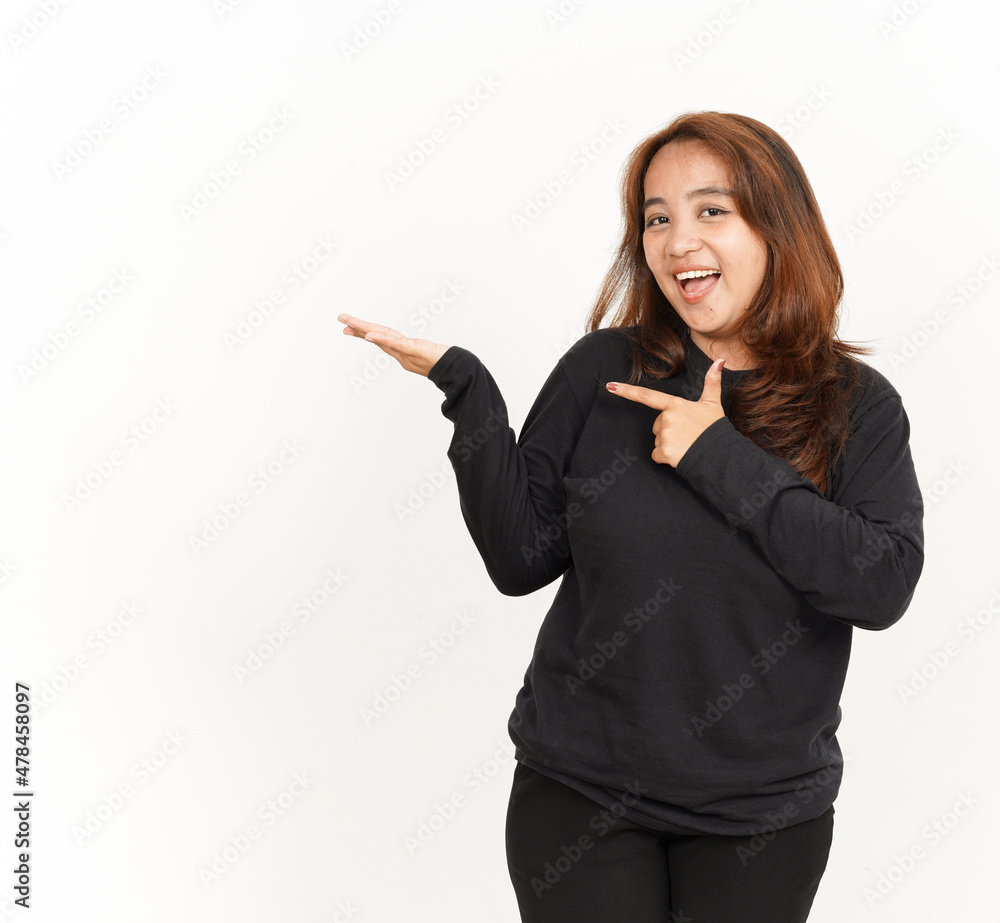 Showing recommended product on open palm Of Beautiful Asian Woman Wearing Black Shirt Showing recommended product on open palm Of Beautiful Asian Woman Wearing Black Shirt