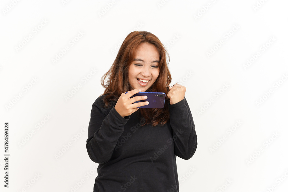 Playing Mobile Game On Smartphone Of Beautiful Asian Woman Wearing Black Shirt Isolated On White Playing Mobile Game On Smartphone Of Beautiful Asian Woman Wearing Black Shirt Isolated On White