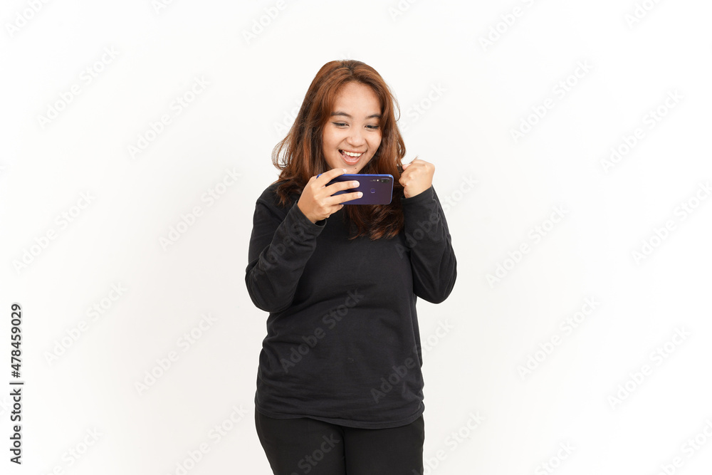 Playing Mobile Game On Smartphone Of Beautiful Asian Woman Wearing Black Shirt Isolated On White Playing Mobile Game On Smartphone Of Beautiful Asian Woman Wearing Black Shirt Isolated On White
