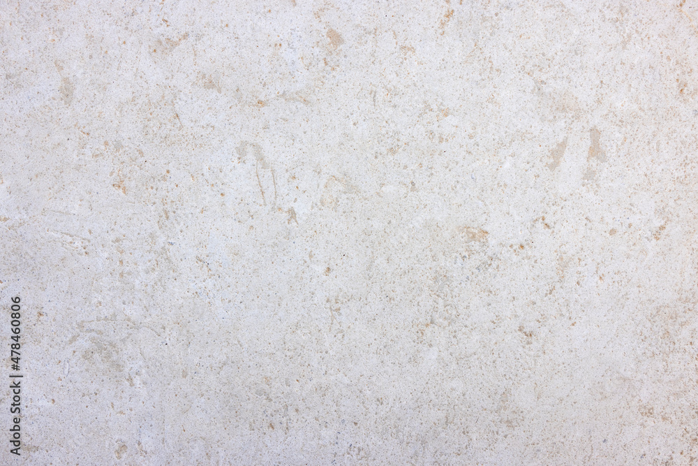 Background or texture of a granite stone with soft beige colors and brown patterns Background or texture of a granite stone with soft beige colors and brown patterns