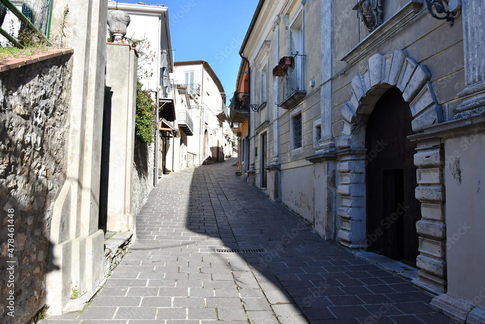 A small street between the old houses of Picerno, a small town in the province of Potenza in Basilicata, Italy.
