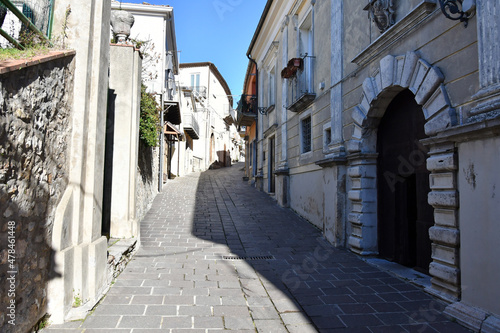Fototapeta Naklejka Na Ścianę i Meble -  A small street between the old houses of Picerno, a small town in the province of Potenza in Basilicata, Italy.