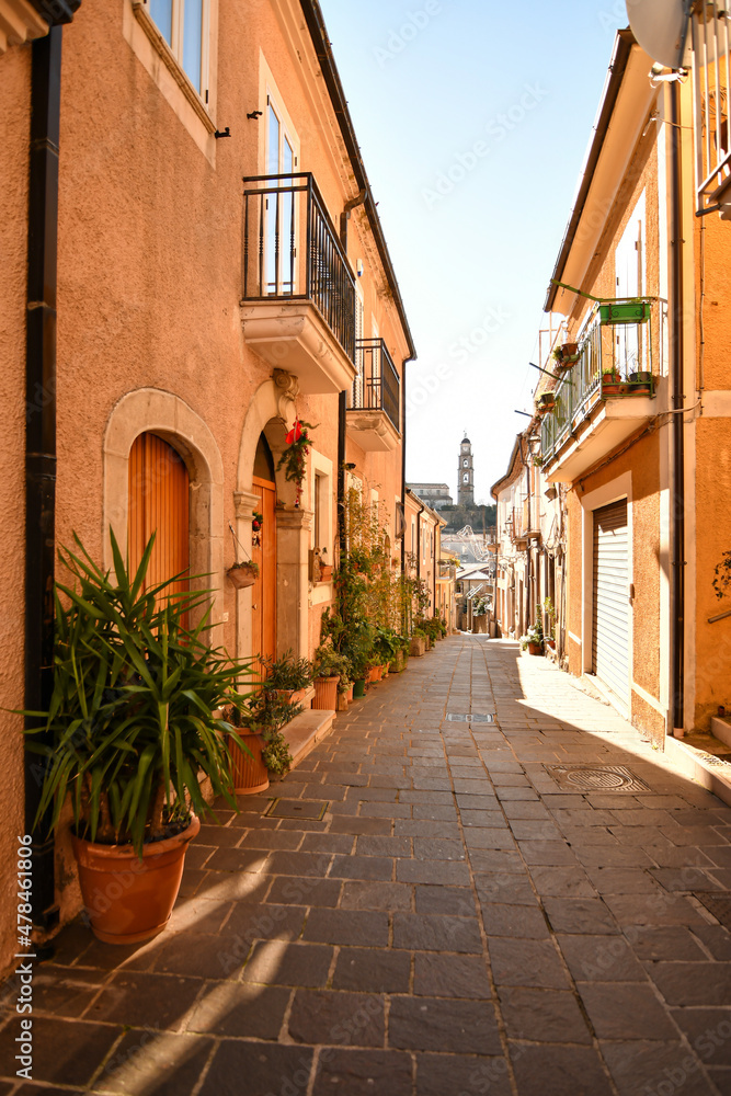 A small street between the old houses of Picerno, a small town in the province of Potenza in Basilicata, Italy.