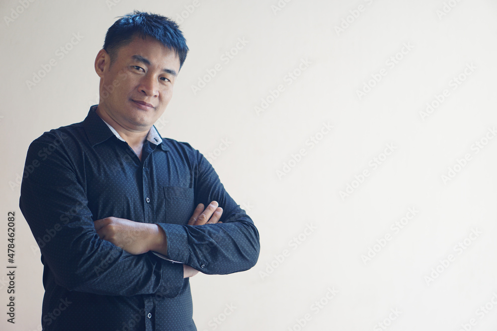 Handsome Asian man crossed arms on chest, confident. look at camera. white background. Handsome Asian man crossed arms on chest, confident. look at camera. white background.