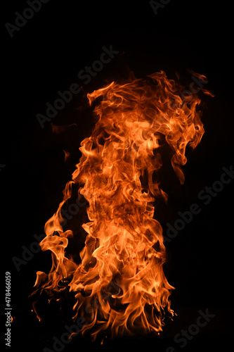 Texture of fire on a black background. Abstract fire flame background, large burning fire.