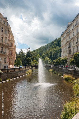 Thermal medical water springs in Karlovy Vary during a beautiful summer day. Travel to Czech Republic, 2021.
