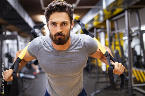 Portrait of fit man working out in gym Fotobehang
