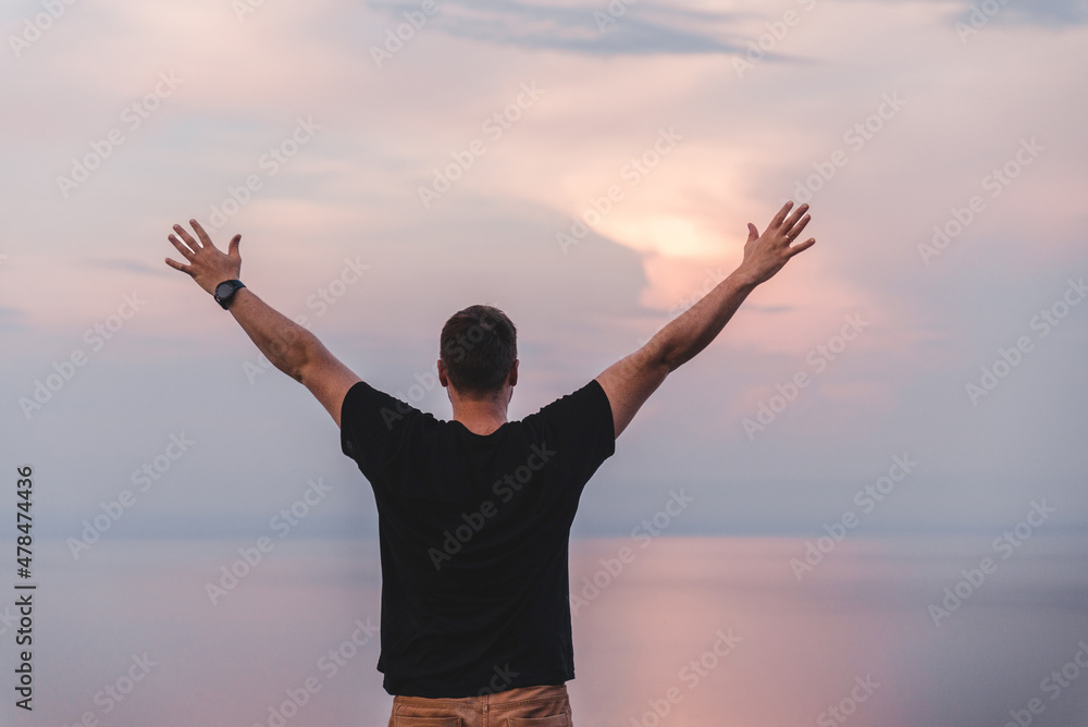man at the cliff sea on background man at the cliff sea on background