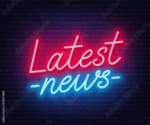 Latest News neon sign on brick wall background