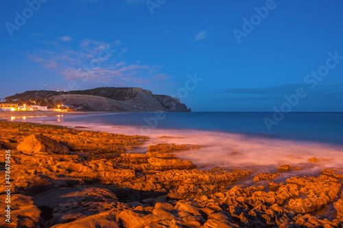 Rocky coast in front of Praia da Luz in the Algarve