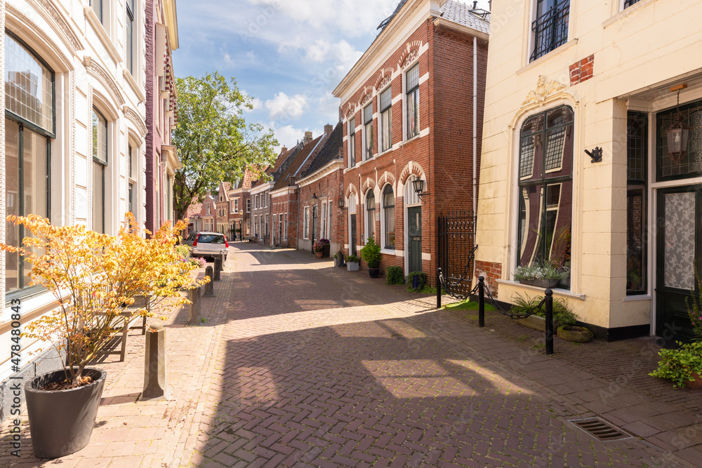 Narrow street in the picturesque town of Appingedam in the north of the Netherlands.