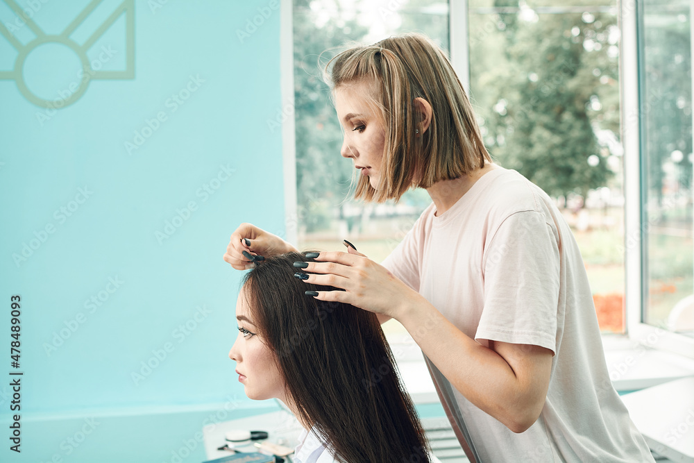 Fototapeta premium high school girls students comb their hair. Anime style