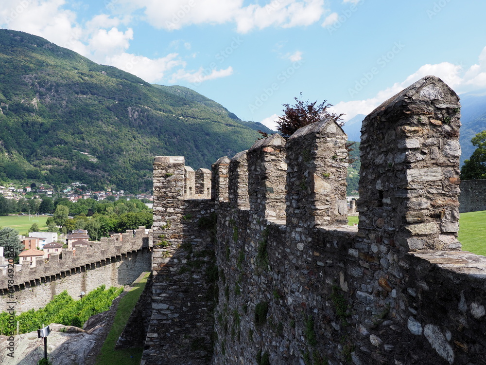 Stony walls of castle in Bellinzona city in Switzerland